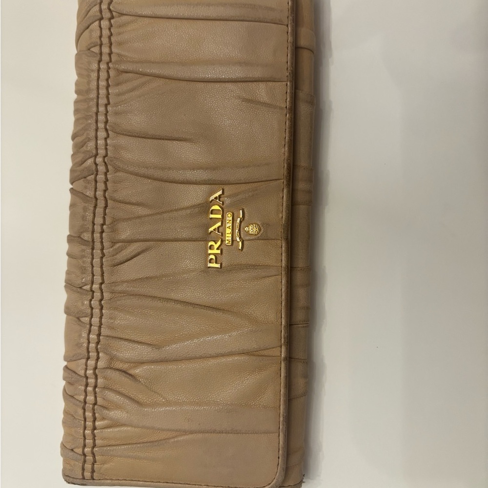 Prada Tan Leather Clutch/wallet.  Used wear shown in pics.